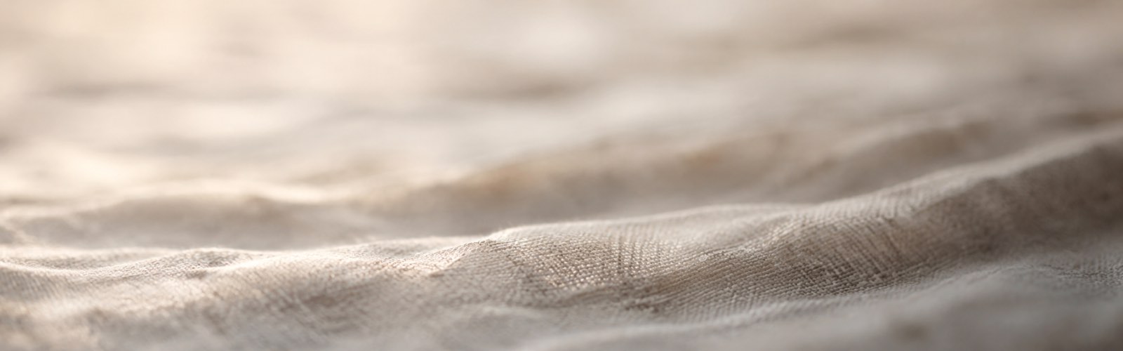 Soft light across raw linen